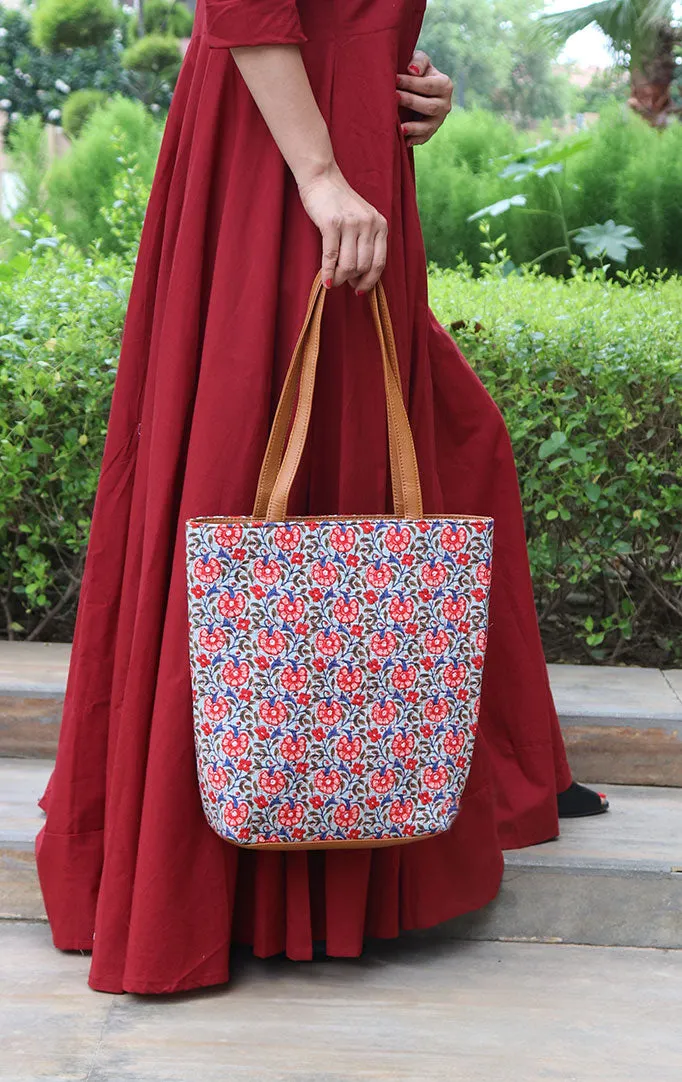 A FLORAL PARODY TOTE BAG