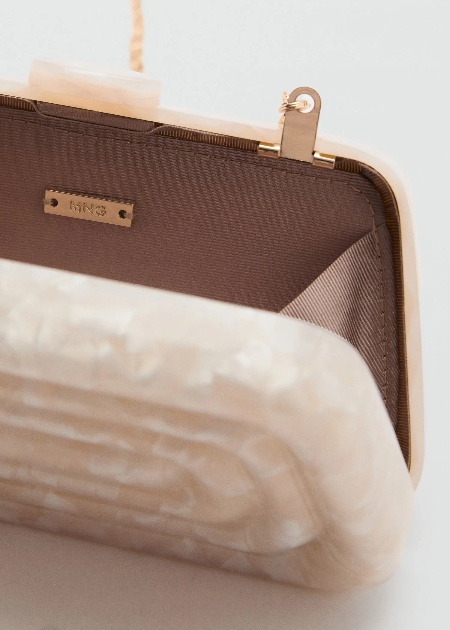 Pearl-effect clutch bag